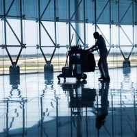 Cleaning staff in an airport hall